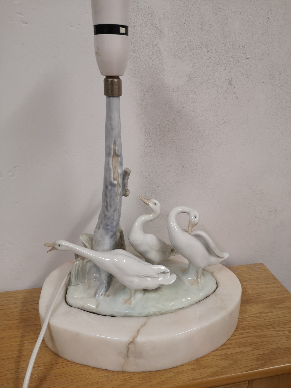 A Lladro porcelain goose table lamp, 10" high.
