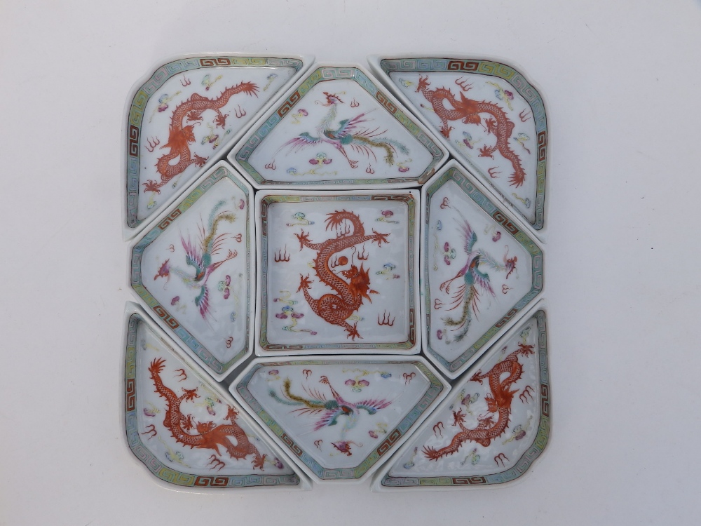 A rare Chinese nine piece square porcelain dragon & phoenix supper set, each piece decorated with