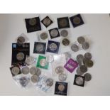 A collection of 20thC commemorative crowns and other coins.