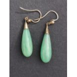 A pair of jade set gold drop earrings, 1.6" overall.