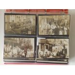 A plastic folder containing approximately 230 early 20thC photographic postcards depicting