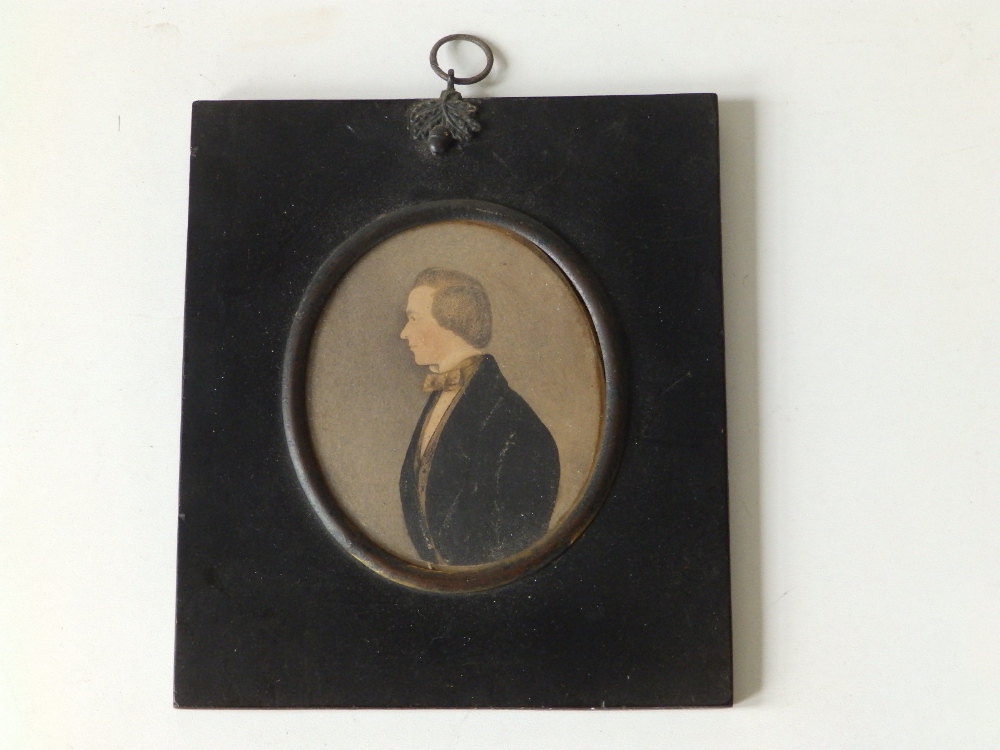 19thC School - oval watercolour miniature - Half length male portrait in profile, 3.75" high.