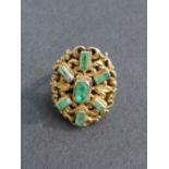 A 19thC Austro-Hungarian emerald set 9ct gold cluster style ring. Finger size J.