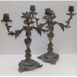 A pair of 19thC silver plated bronze twin-branch candelabra by Thomas Abbott, in rococo revival