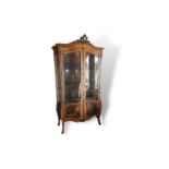 A late 19thC ormolu mounted Vernis Martin vitrine with painted panels signed 'H. Martin', having a