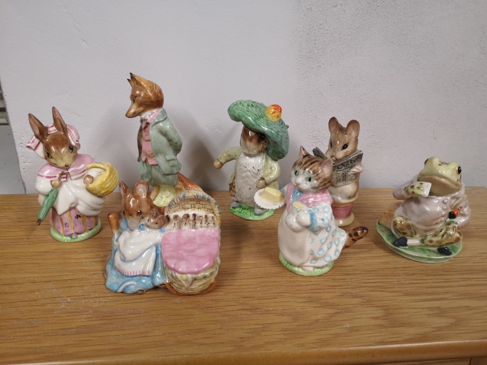 Five Beswick Beatrix Potter figures with gold backstamps, together with two other damaged