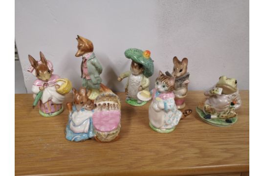 Five Beswick Beatrix Potter figures with gold backstamps, together with two other damaged - Image 1 of 2