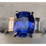 A certified natural 5.29 carat colour change Sri-Lankan sapphire & diamond ring, the rectangular