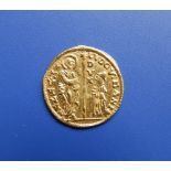 A Venetian gold ducat, 3.4g, 21.8mm maximun diameter.