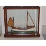 An early 20thC cased display scale model of the small 'Passenger Boat Miss Newquay, 1/2 " to the