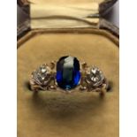 A Victorian/Edwardian certified natural sapphire & diamond three stone gold ring, the rectangular