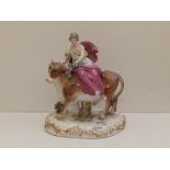 A Meissen porcelain figure group depicting Europe and the Bull, blue crossed swords mark, incised '