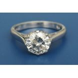 A diamond solitaire ring, the brilliant cut stone weighing approximately 1.3 carats, claw set in