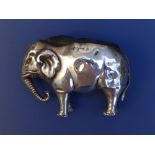 A silver elephant pin cushion - rubbed Birmingham marks for HVP & Co., 2.5" across - a/f.