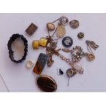 A silver mounted Wedgwood jasper brooch and a small quantity of costume jewellery