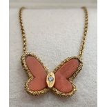 A Van Cleef & Arpels Alhambra coral & diamond set 18ct gold butterfly pendant necklace, 24040K432,