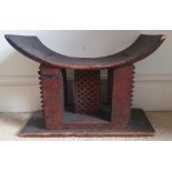 An African Ashanti stool, 19" across.