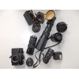 A collection of 20thC cameras and lenses, including Helios 44-2, Carl Zeiss Jena DDR, Pentacon 1.