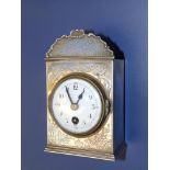 A silver chinoiserie boudoir clock with convex dial (hairline cracks), French 'Exacta' movement,