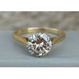 A diamond solitaire ring, the brilliant cut stone weighing approximately 1.3 carats, of