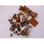 Thimbles, buttons and other sewing accessories.