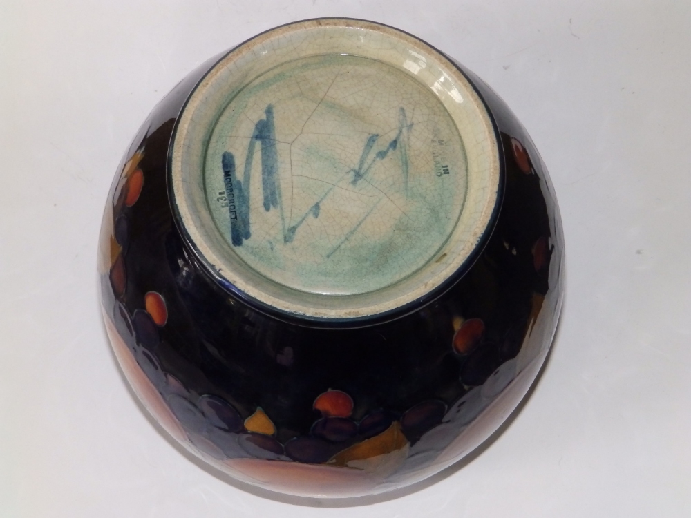 A Moorcroft Pomegranate pattern cache pot, impressed 'Moorcroft, Made in England' and blue painted - Image 4 of 5