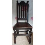 An early Georgian oak panel seated chair with scroll cresting above rail back ,Height 42" - old iron