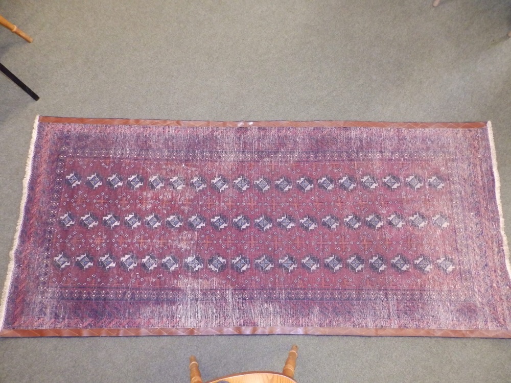 A Bokhara style Baluchi rug, woven with three rows of octagons, 90" x 41". - Image 5 of 6