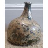 An English onion shaped glass wine bottle, circa 1700, 6" high.