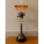 A 19thC German brass oil lamp by Hugo Schneider of Leipzig, 18.5" excluding shade.