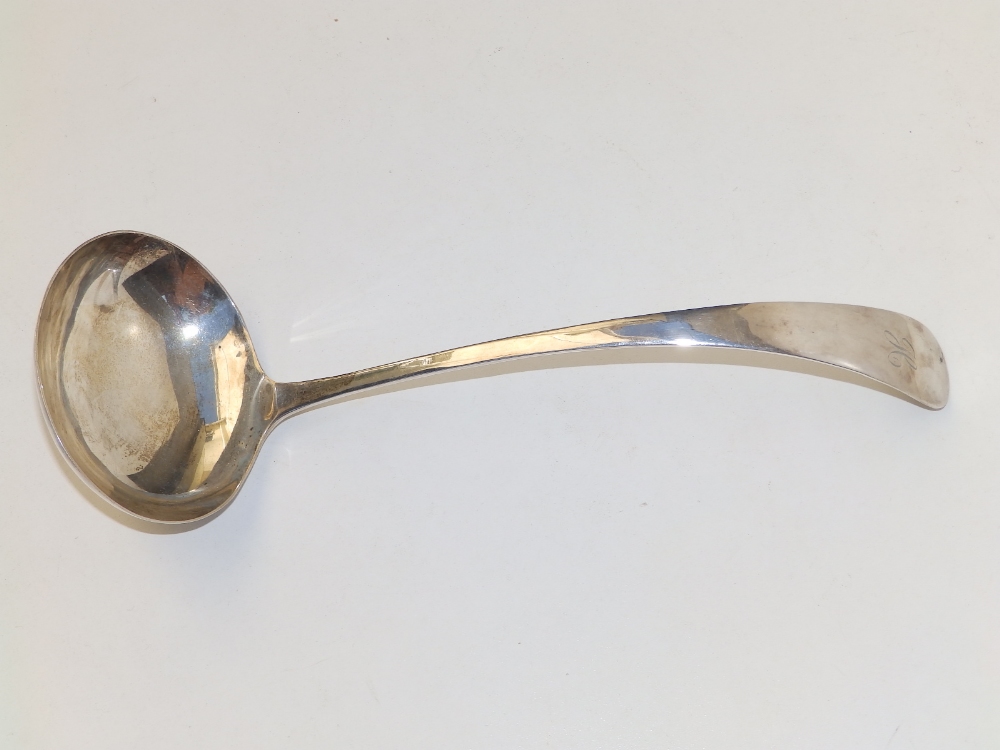 A silver soup ladle - EV, Sheffield 1930, 11".