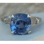 A certified natural 5.34 carat colour change Sri-Lankan sapphire solitaire ring, the rectangular