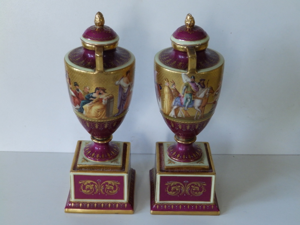 A pair of Vienna porcelain two-handled vases of urn shape on square pedestal bases, the sides - Image 5 of 14