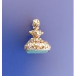 A gold pendant seal set with jade, 1.2" high.