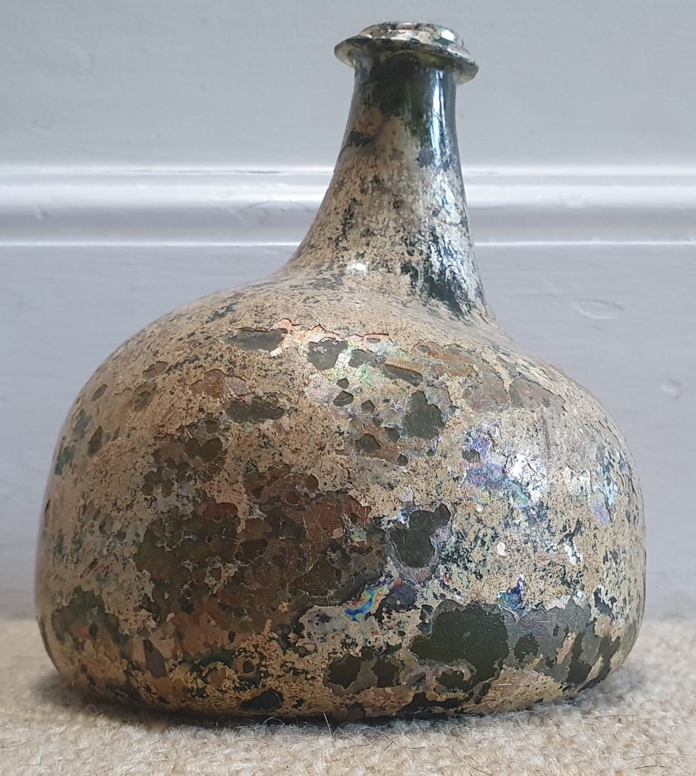 An English onion shaped glass wine bottle, circa 1700, 6" high. - Image 2 of 4