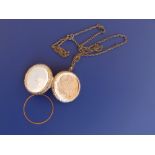 A 9ct gold circular locket on necklace chain.