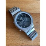 A gent's stainless steel Seiko chronograph wrist watch 7a38-7070 - needs a battery.