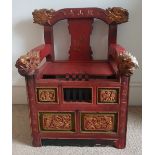 An antique Chinese red & gold lacquered throne chair, having dragon head finials and incised script,