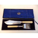 A pair of ivory-handled silver fish servers, GH, Sheffield 1912, 12" in Harrods box - one handle