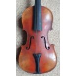 A Stradivarius copy violin with two piece back, having 13.25" back, in wooden case (case a/f)
