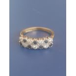 A sapphire & diamond ring set as two rows in 18ct gold. Finger size M/N.