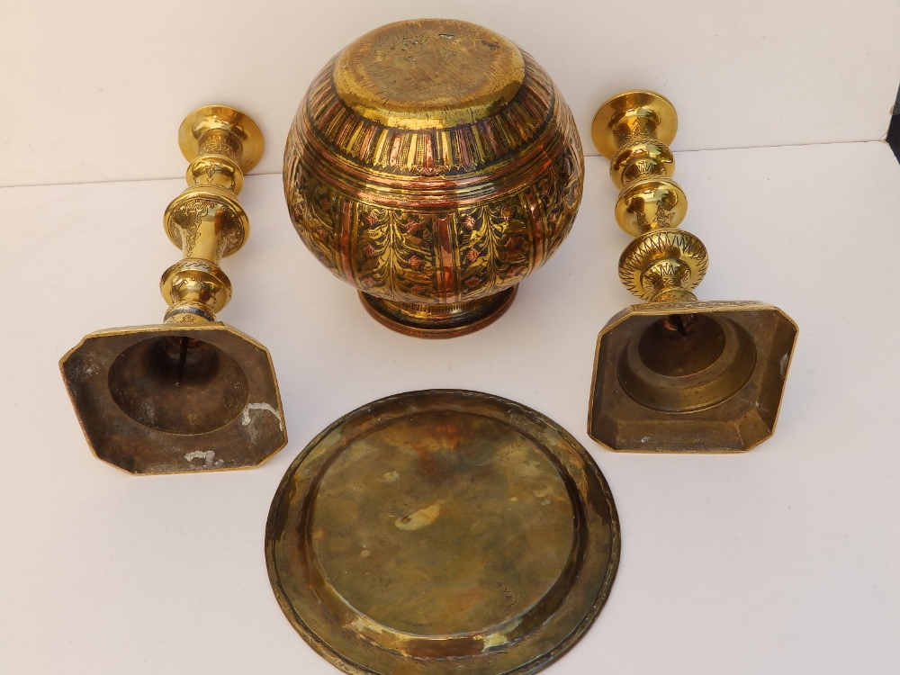 A brass Cairo ware vase, 5.5" high, two 9" candlesticks and a 6.5" circular tray. (4) - Image 2 of 2