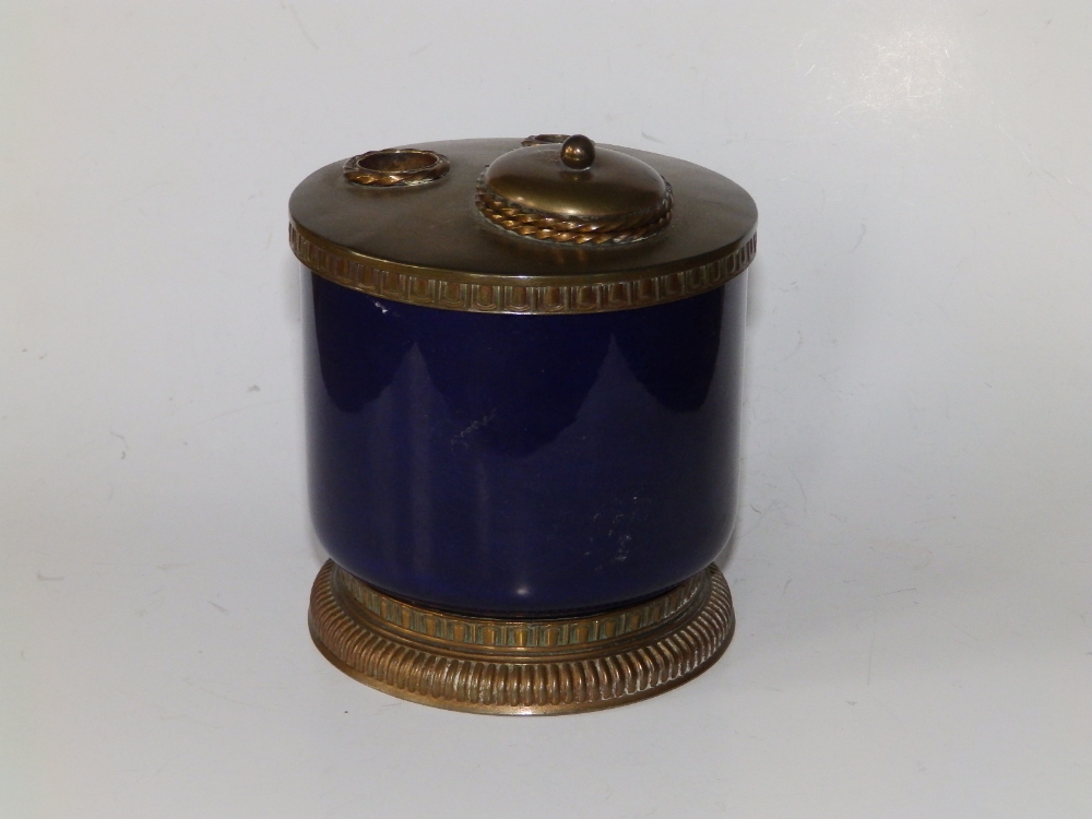 A late 19thC bleu-de-roi glazed circular encrier with gilt metal mounts, 4.1" high.