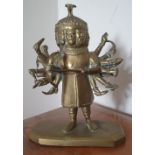 An Indian brass figure of a deity with many arms and faces, 6.6" high.