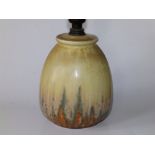 A Ruskin Pottery cream glazed table lamp with brown & green variegation - '1932', 6" high