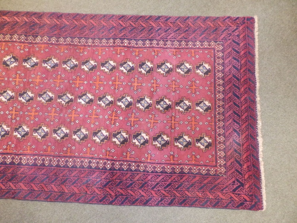 A Bokhara style Baluchi rug, woven with three rows of octagons, 90" x 41". - Image 2 of 6