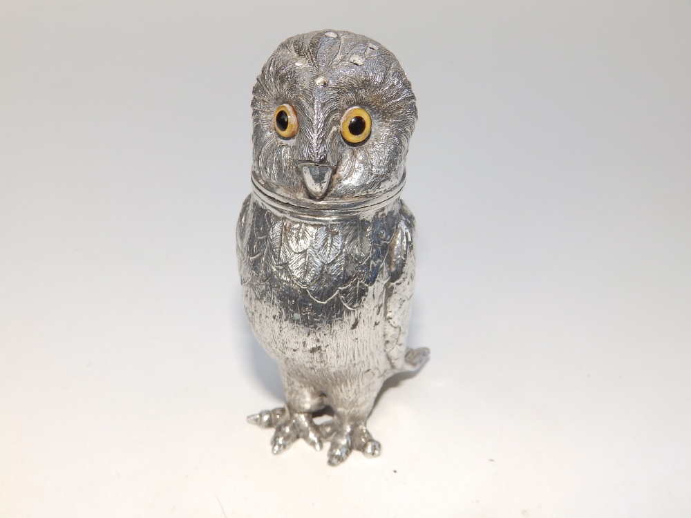 A silver plated caster/pounce pot modelled as an owl with glass eyes, 4" high. - Image 2 of 4