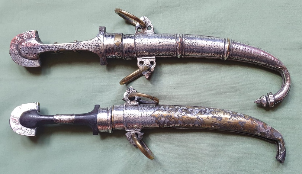 Two silver mounted Moroccan jambiya knives, 15".