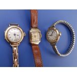 A lady's 18ct gold 'Trusty' wrist watch on damaged 9ct gold patent expanding strap and two ladies'