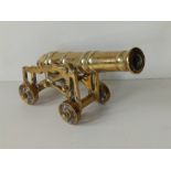An antique brass signalling cannon, 8" across.
